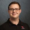 A headshot of Zachary Schleter, communications specialist for UL Lafayette Online.